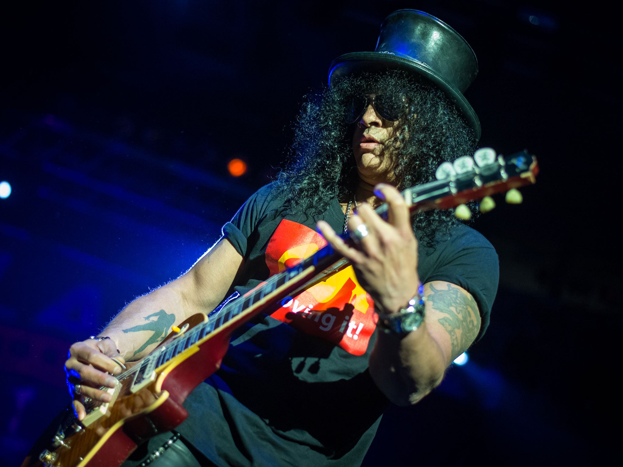 Slash performs on stage during a concert in Ljubljana