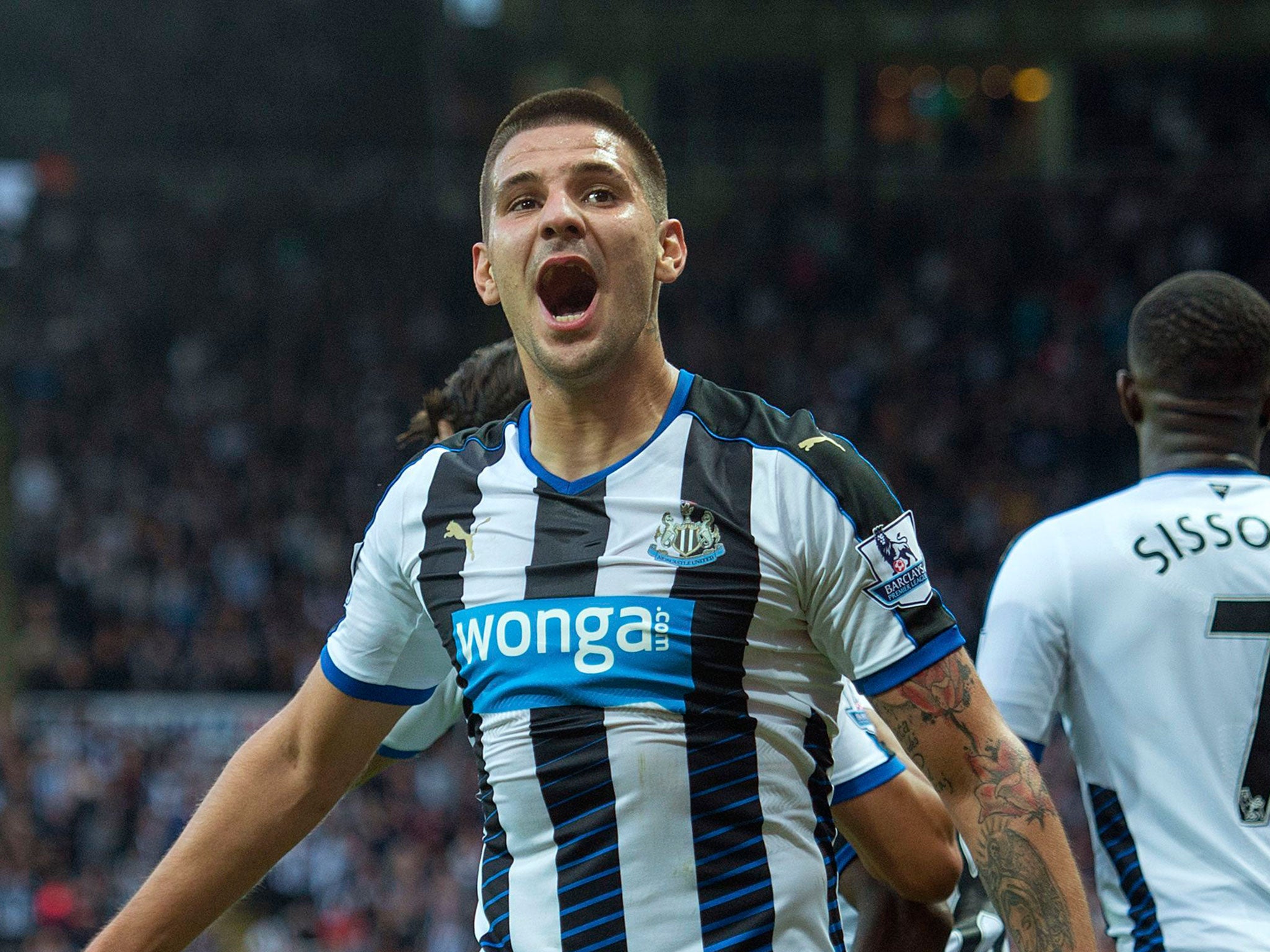 Newcastle striker Aleksandar Mitrovic celebrates one of his side’s goals in the 2-2 draw with Chelsea