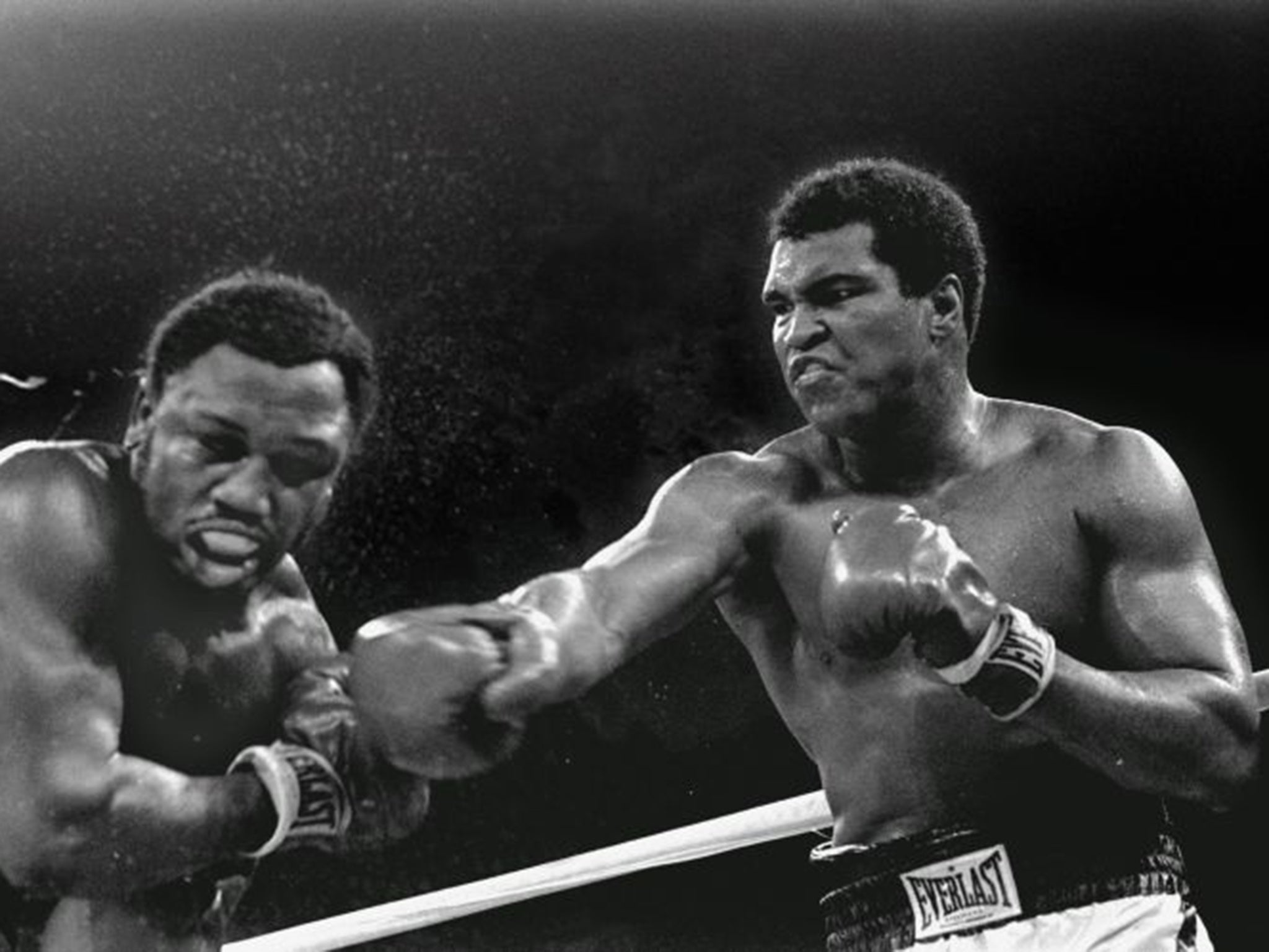 Muhammad Ali lands a blow on Joe Frazier