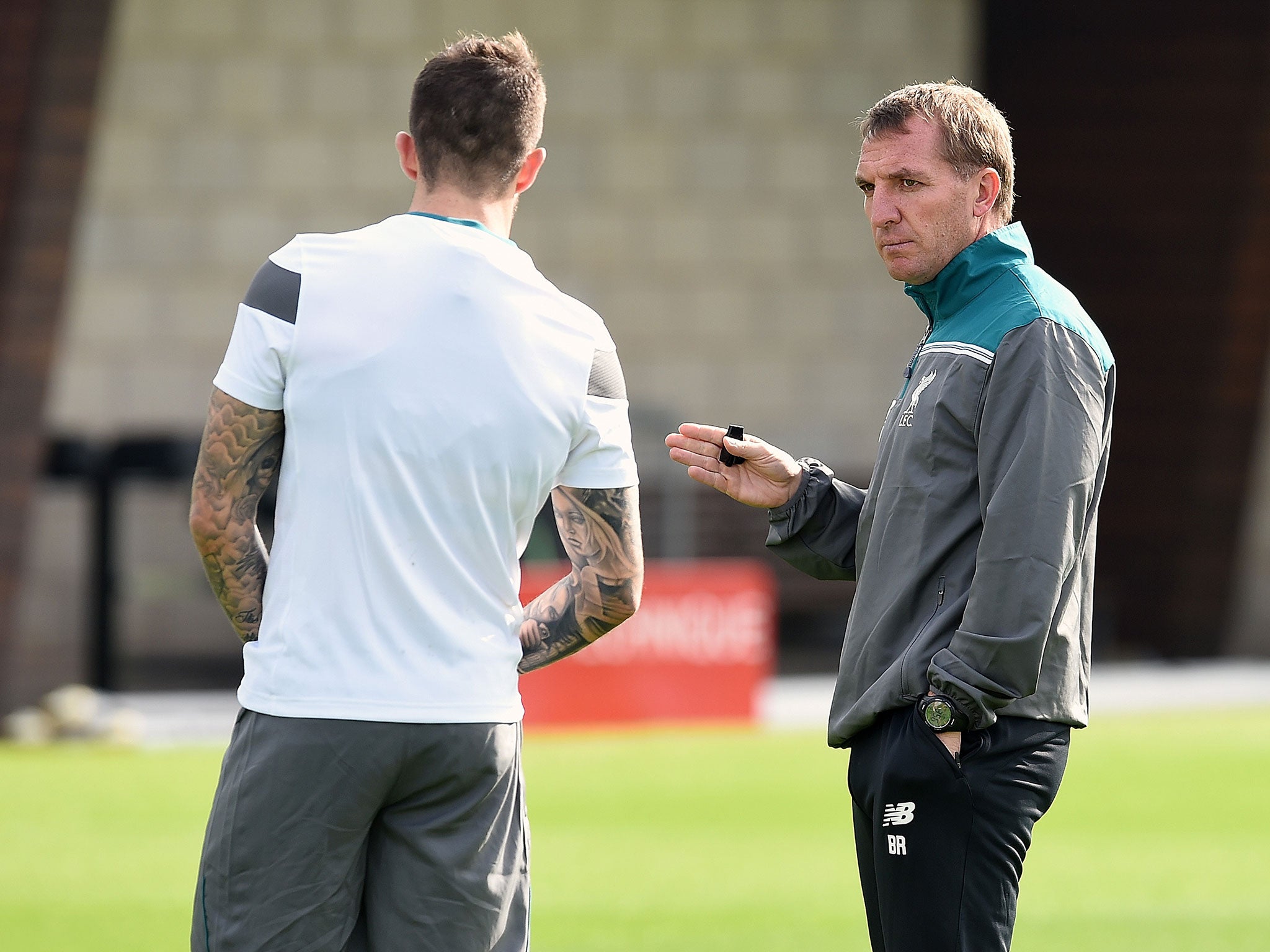 Brendan Rodgers running one his final Liverpool training sessions