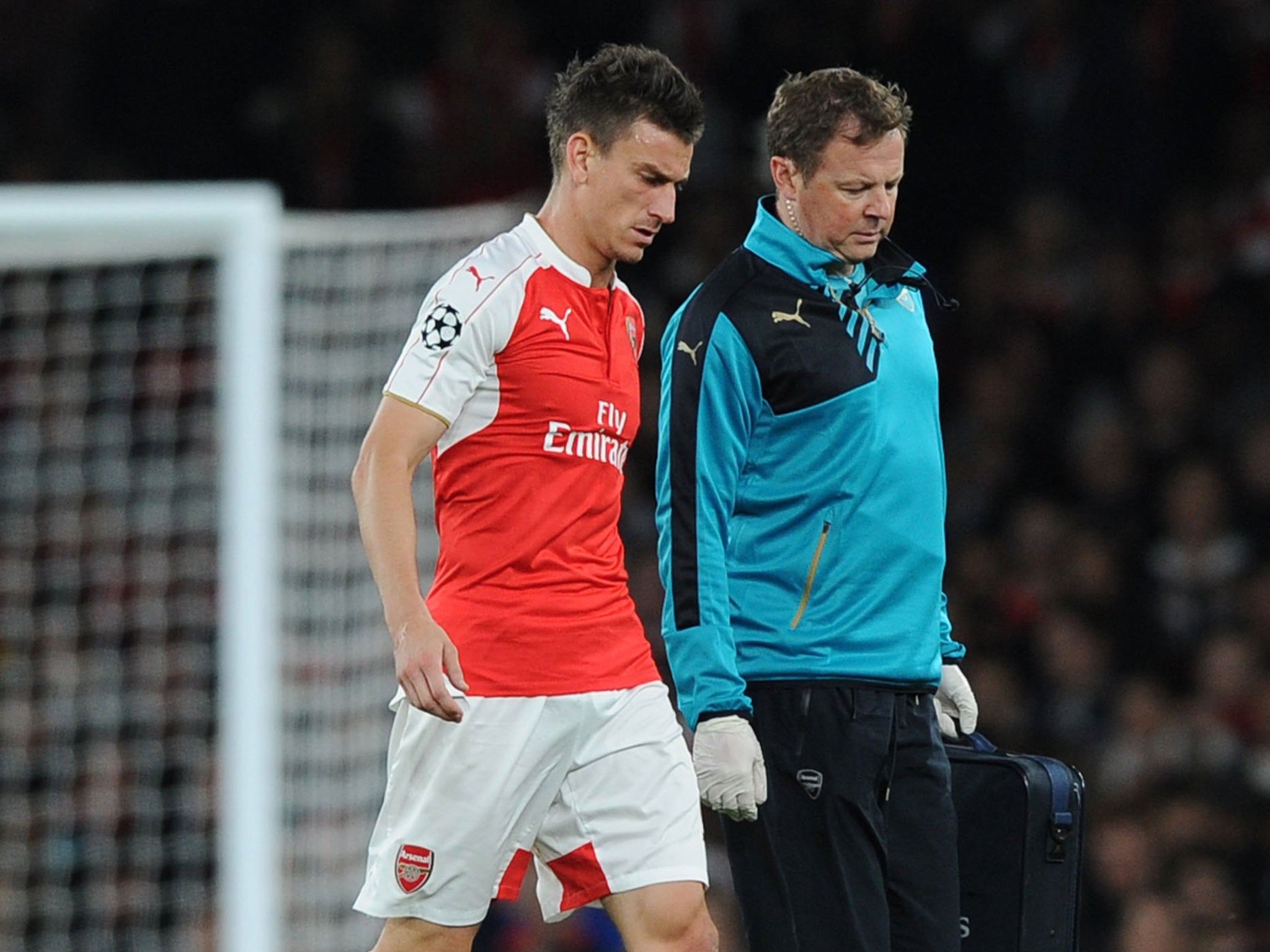 Laurent Koscielny limps off against Olympiakos