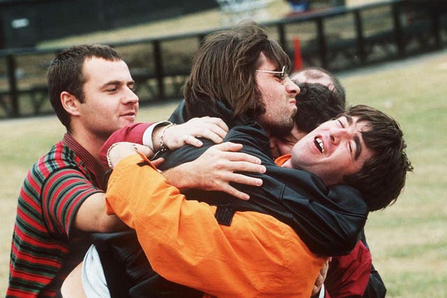 Oasis before their famous Knebworth gigs in 1996. Oh the bromance.