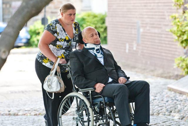 Helen and Alan Knight at an earlier court appearance where Alan pretended to be unconscious