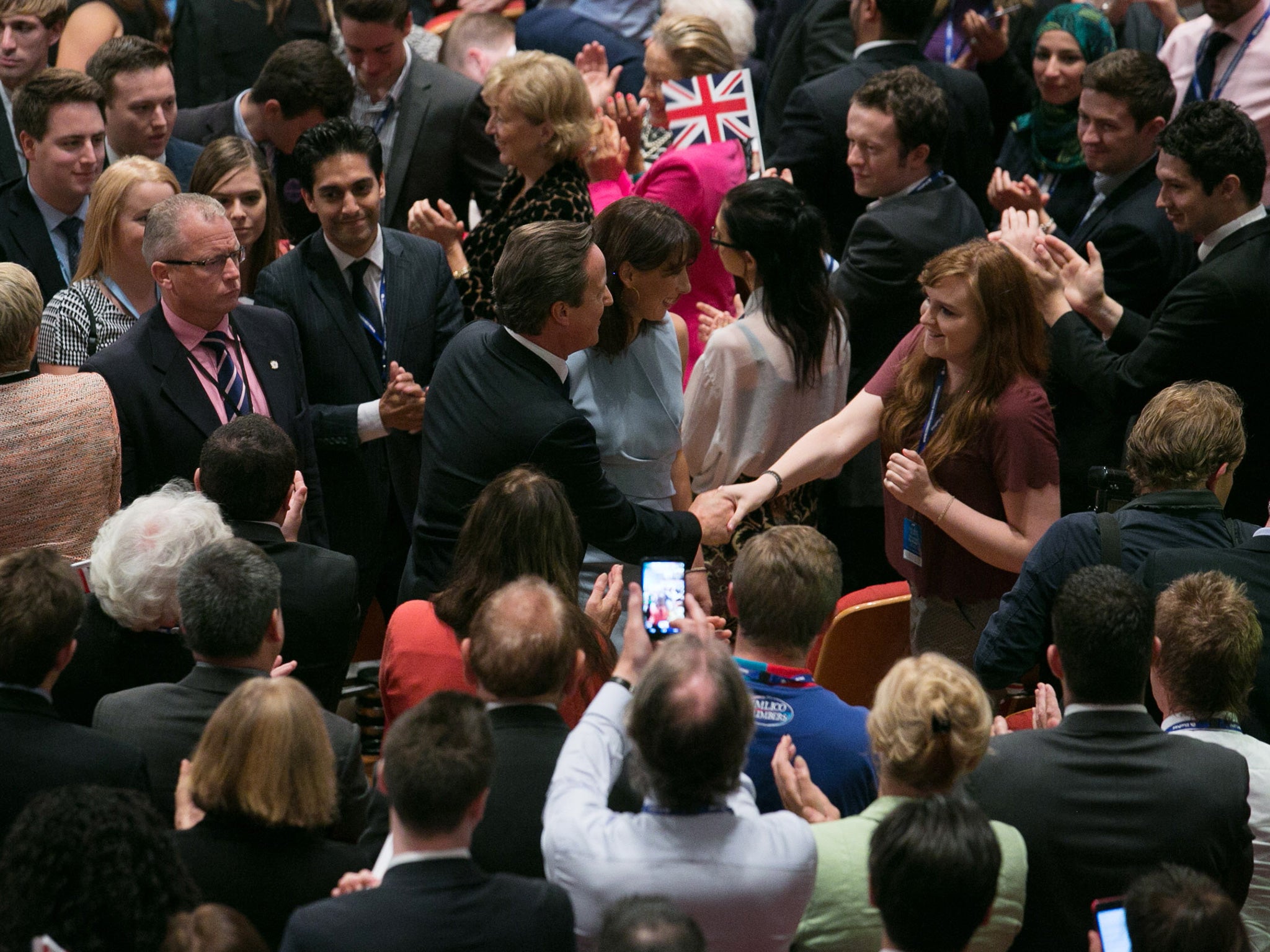 David Cameron greets supporters following his speech at 2014 Conservative Party Conference on Birmingham