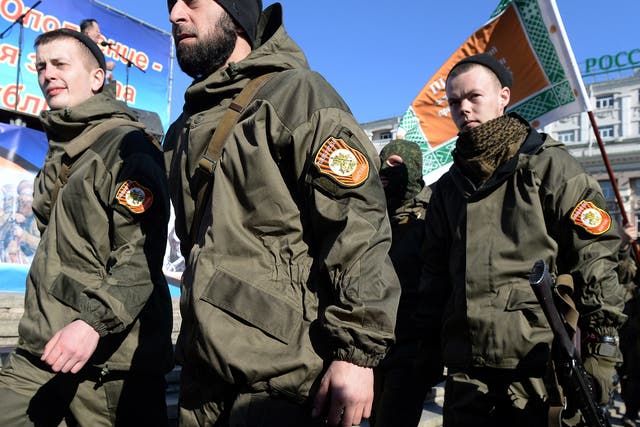 Pro-Russian Separatists of the self-proclaimed Donetsk People’s Republic attend a rally