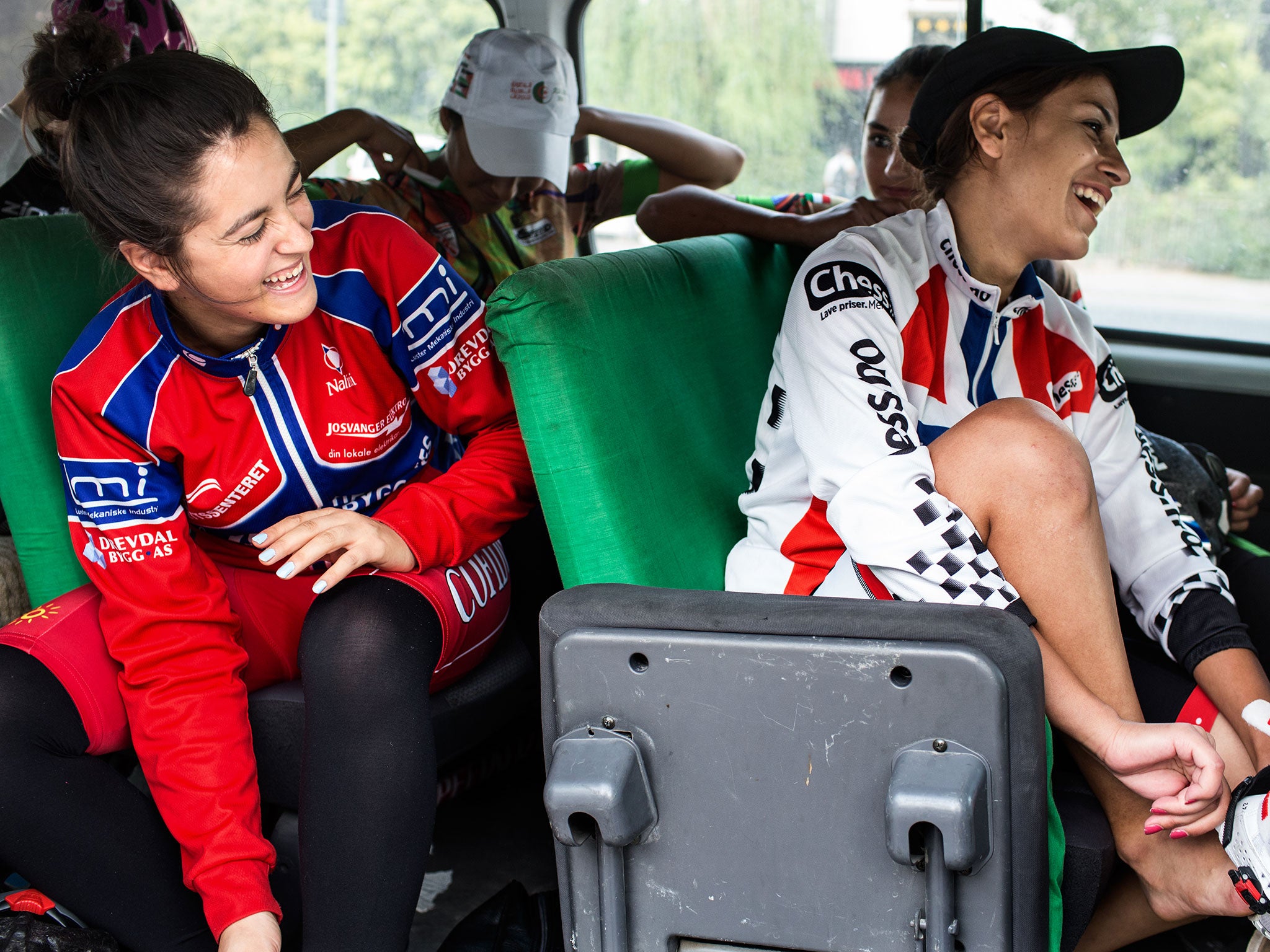 Iraqi national cycling team members Helen Ghrib, left, 18, and Sozi Dilshad prepare for a training ride with other Newroz cyclists