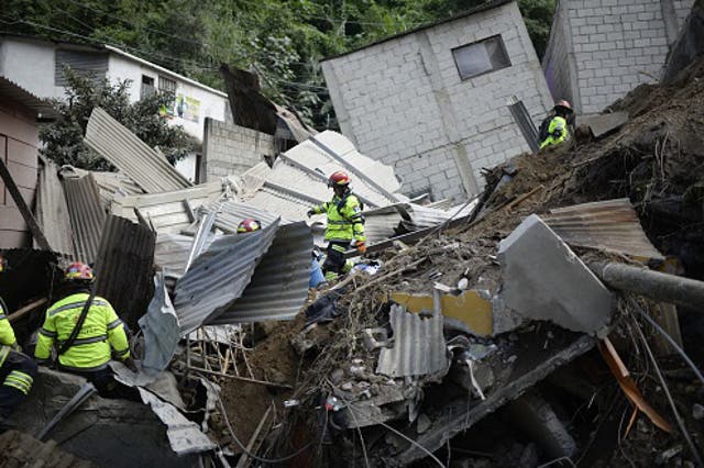 The hillside collapsed on top of the small suburb late on Thursday evening