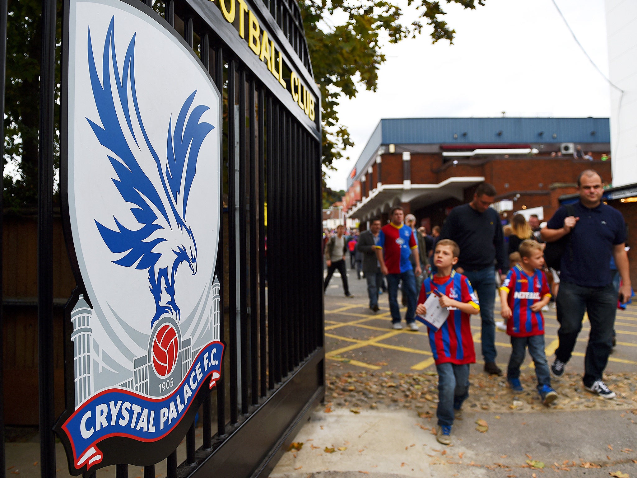 Crystal Palce fans outside Selhurst Park, where today's early kick-off takes place