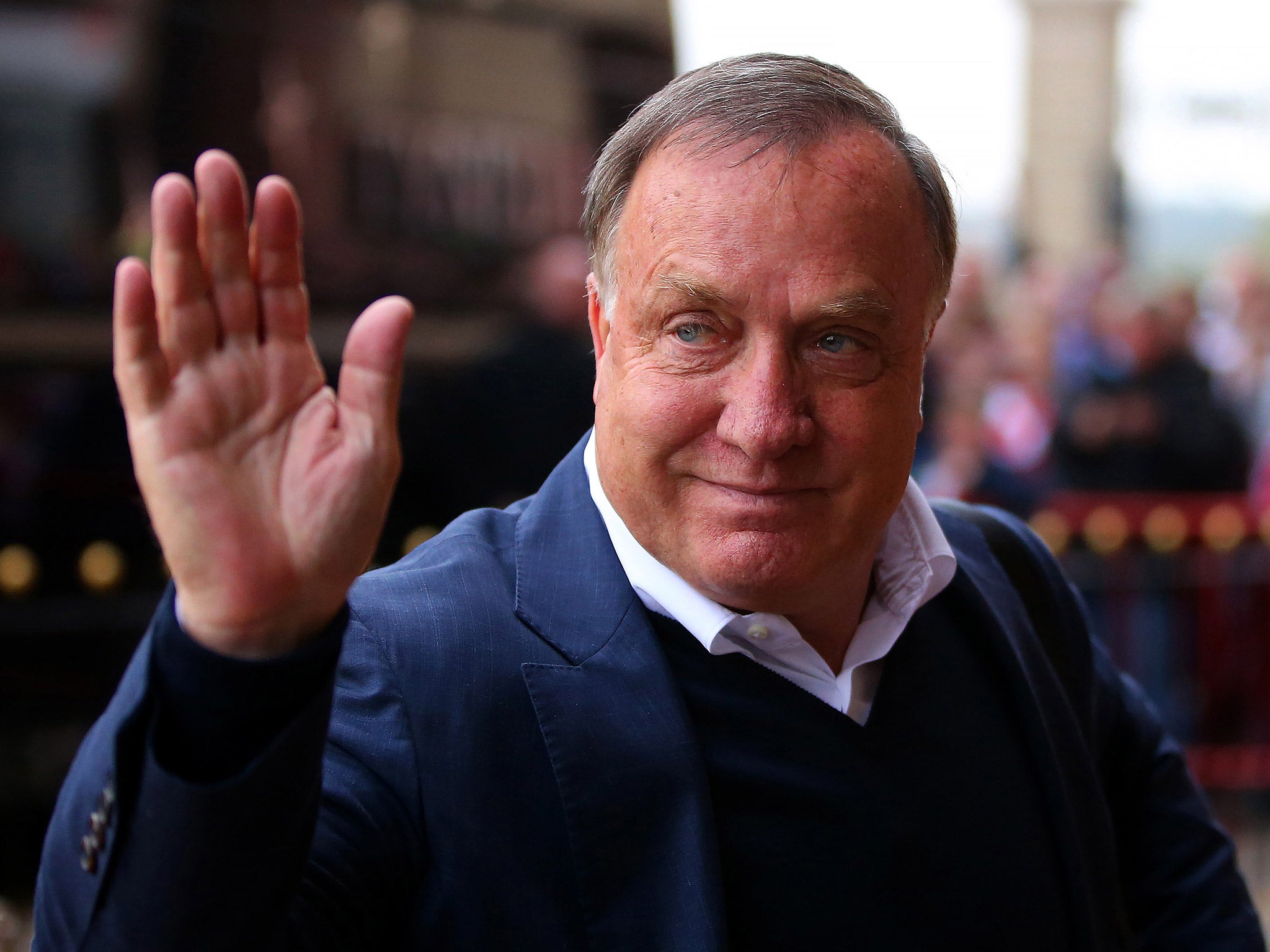 Dick Advocaat greets the crowd outside the Stadium of Light
