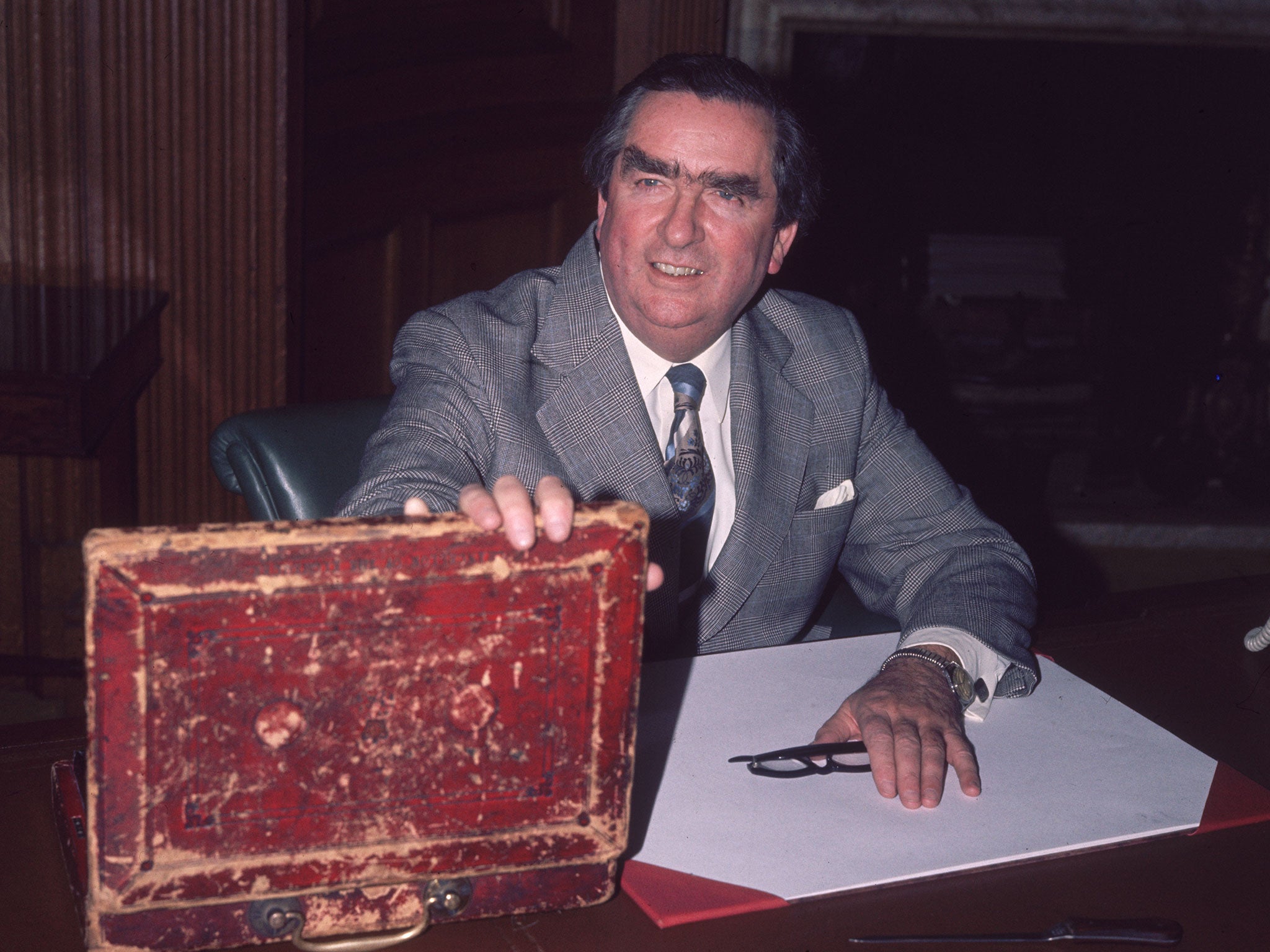 Denis Healey opening the budget box at his Treasury office in London, in 1977 during his time as Chancellor.