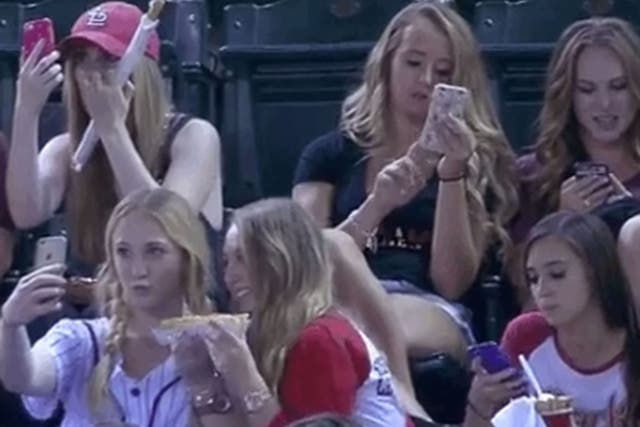 These girls were mocked for taking selfies at a baseball game - but is it any wonder they did it?