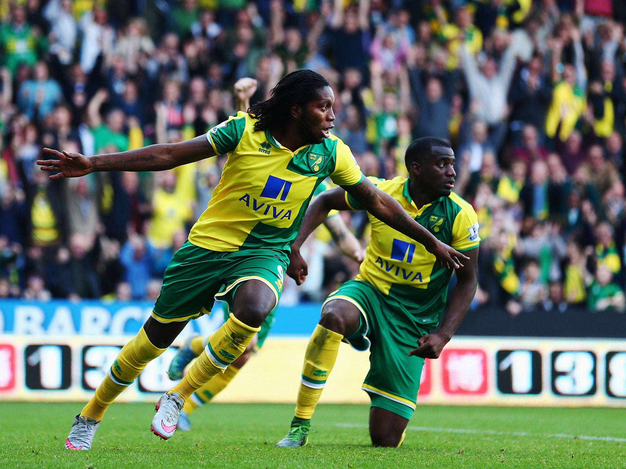 Dieumerci Mbokani celebrates his first goal for his new club