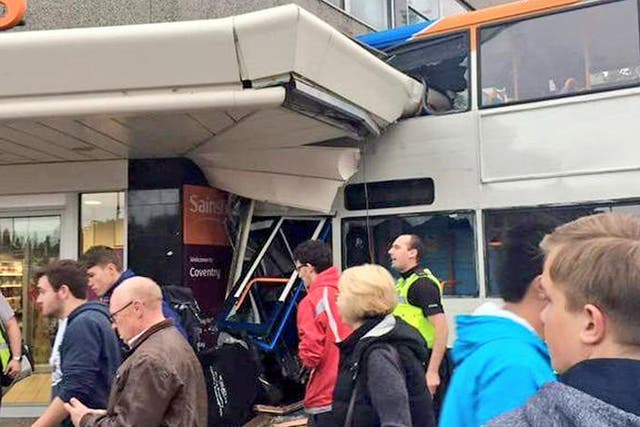 The scene where a bus crashed into a Sainsbury's supermarket in Coventry