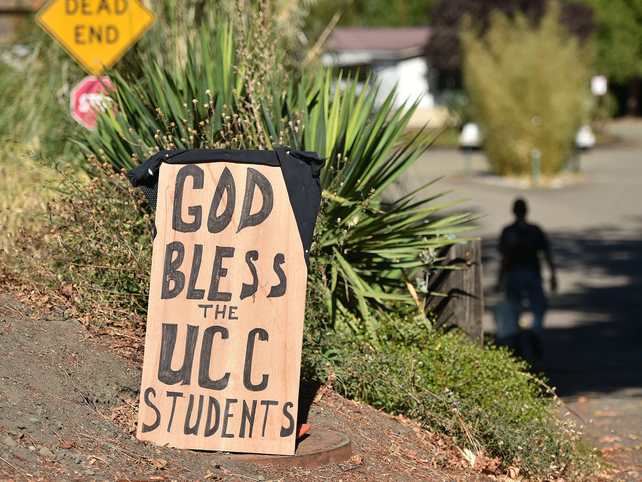 A sign shows support for the victims of the mass shooting that took place in Windsor, Oregon
