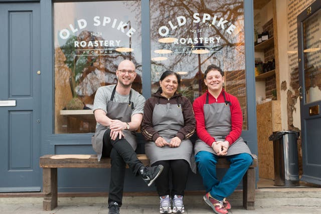Richard Robinson, Lucy (c) and Cemel Ezel outside the Old Spike Roastery