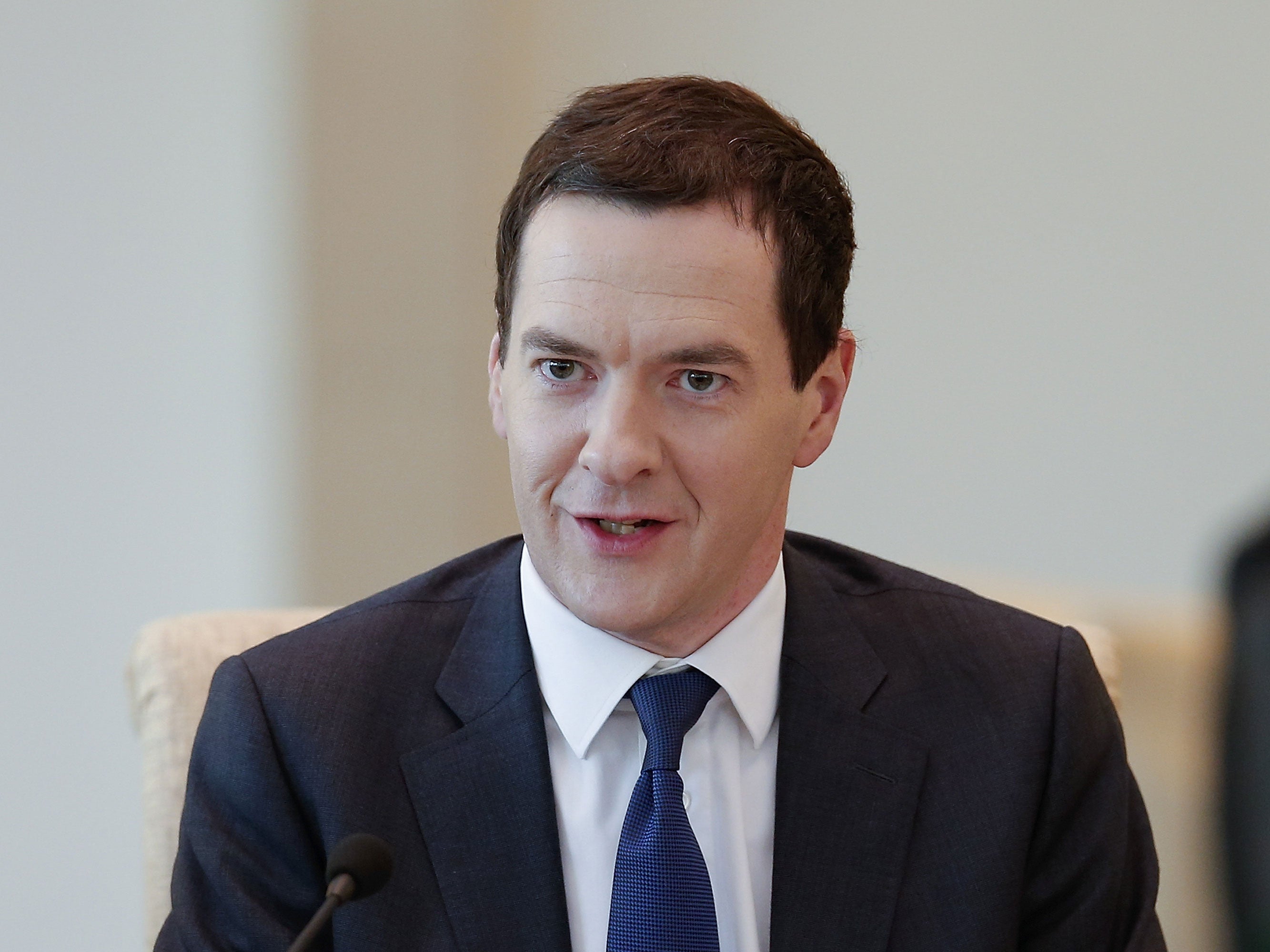 Chancellor of the Exchequer George Osborne speaks with Chinese Vice President Ma Kai (not pictured) during the 7th China-UK strategic economic dialogue at Diaoyutai State Guesthouse on September 21, 2015 in Beijing, China.