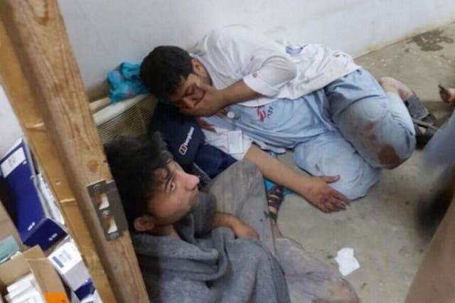 Medical staff in the immediate aftermath of an airstrike against their hospital in Kunduz, Afghanistan