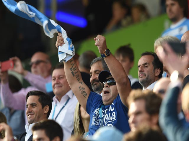 Diego Maradona cheers on Argentina against Tonga