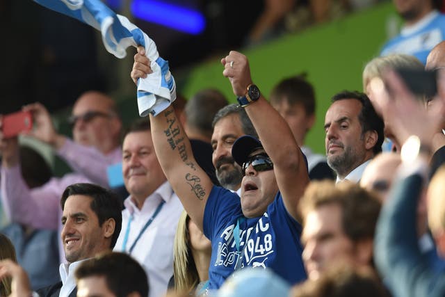 Diego Maradona cheers on Argentina against Tonga