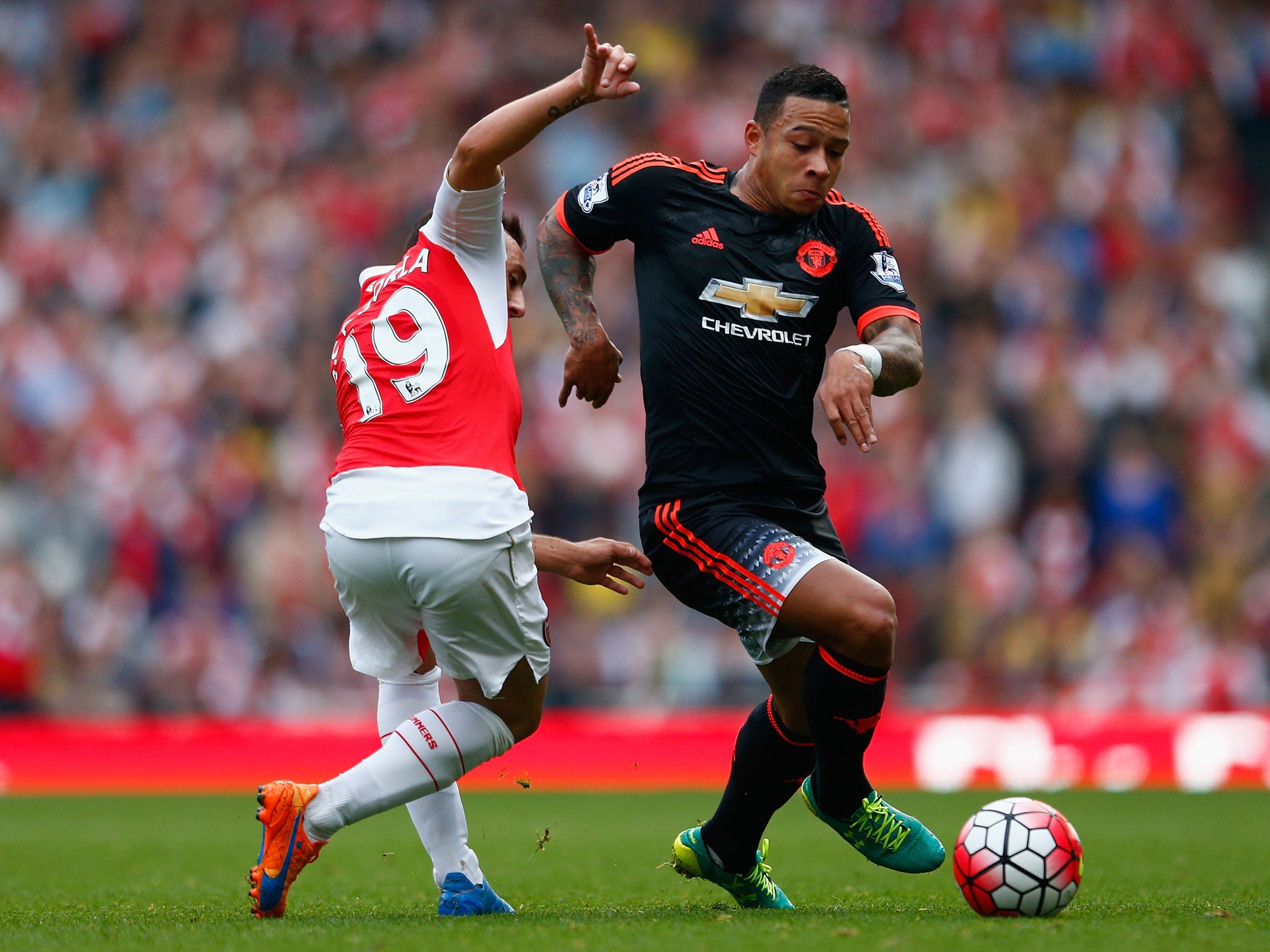 Memphis Depay (right) in action for Manchester United