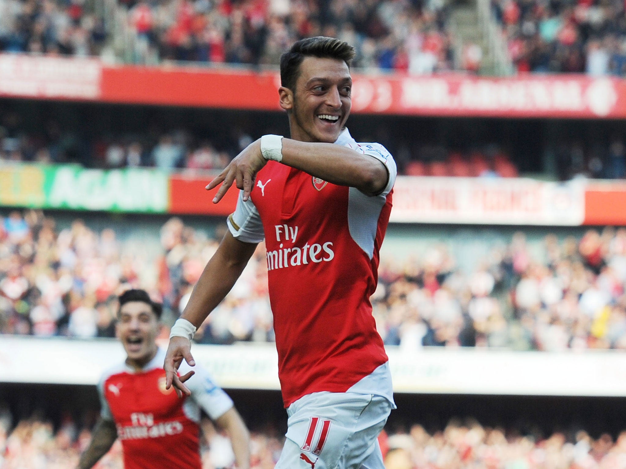 Mesut Ozil celebrates Arsenal's second goal