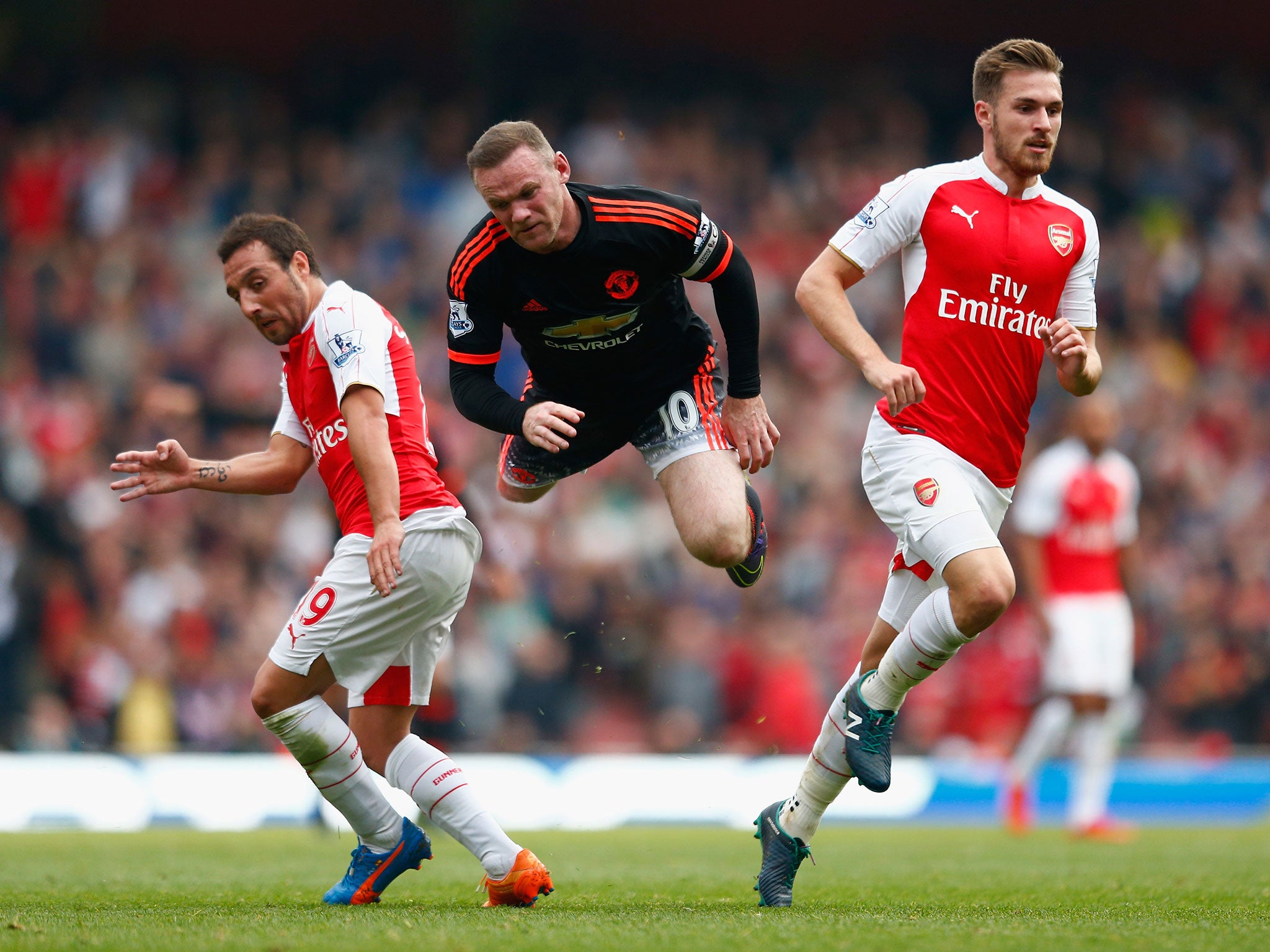 Wayne Rooney in action against Arsenal