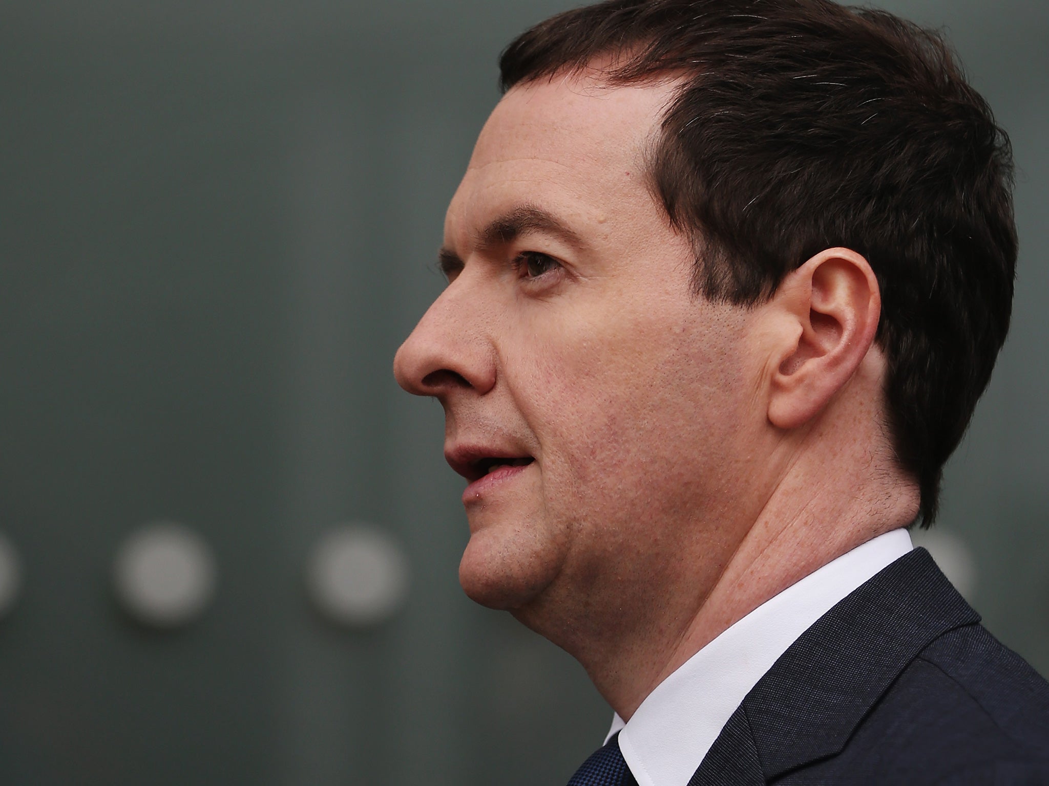British Chancellor George Osborne arrives on day one of the Conservative Party Conference in Manchester