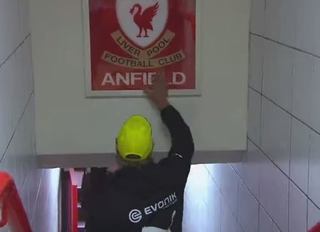 Jurgen Klopp touches the Anfield sign in August 2014