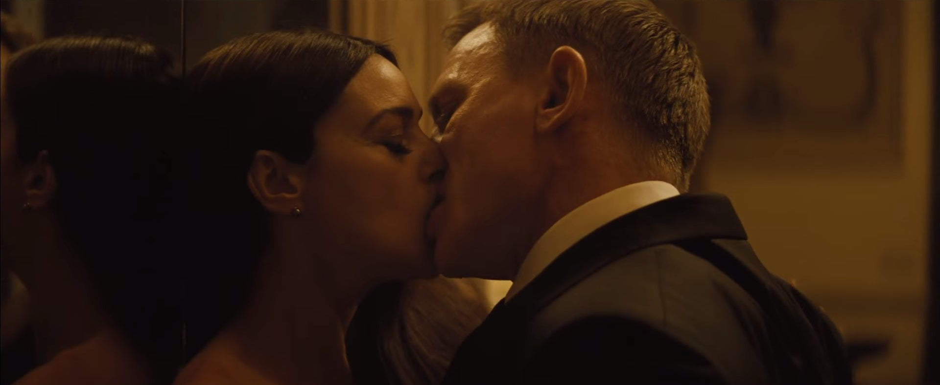 A shot from Smith's music video showing Daniel Craig and Monica Bellucci's characters kissing