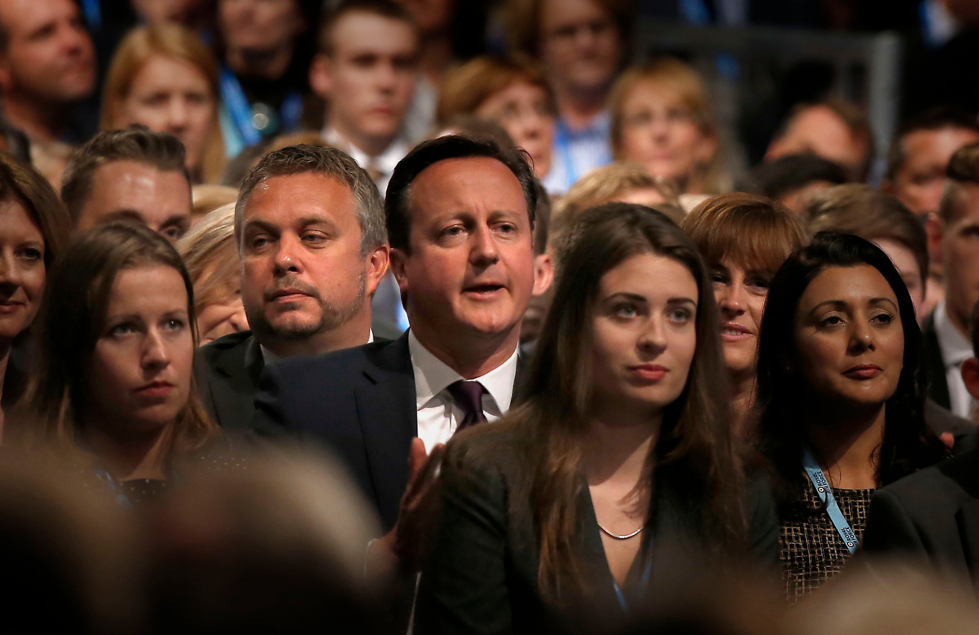 David Cameron watches on as George Osborne delivers his keynote speech to the Tory party conference