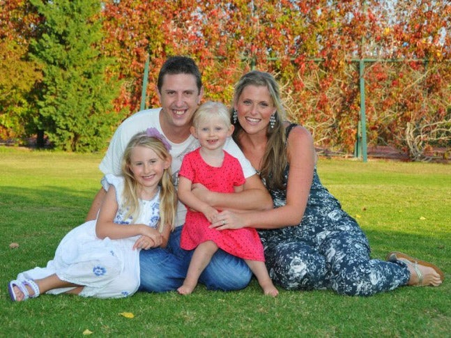 Handout image from Merseyside Police of PC Dave Phillips with his family