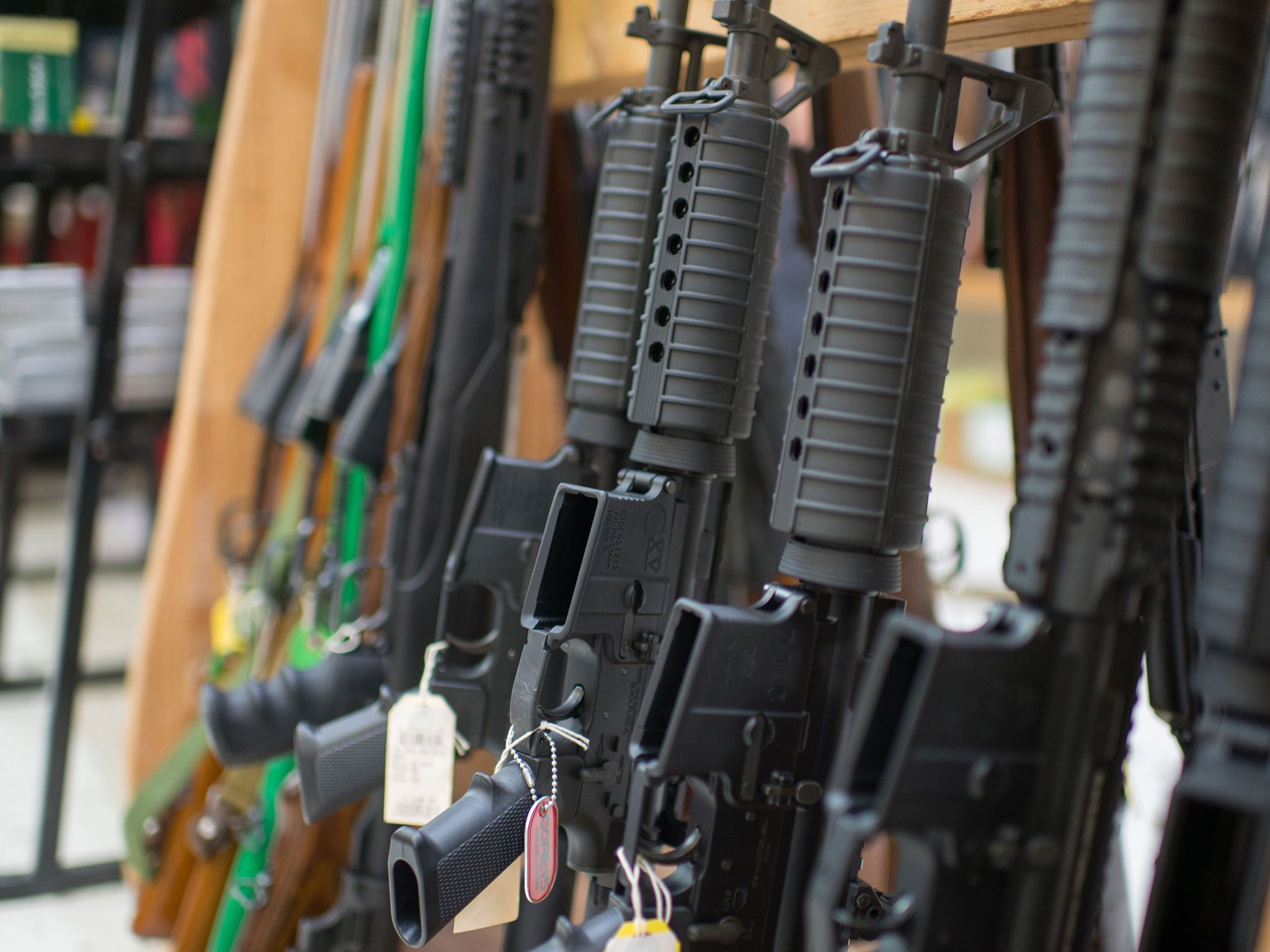 Guns are on display at Roseburg Gun Shop in Roseburg, Oregon