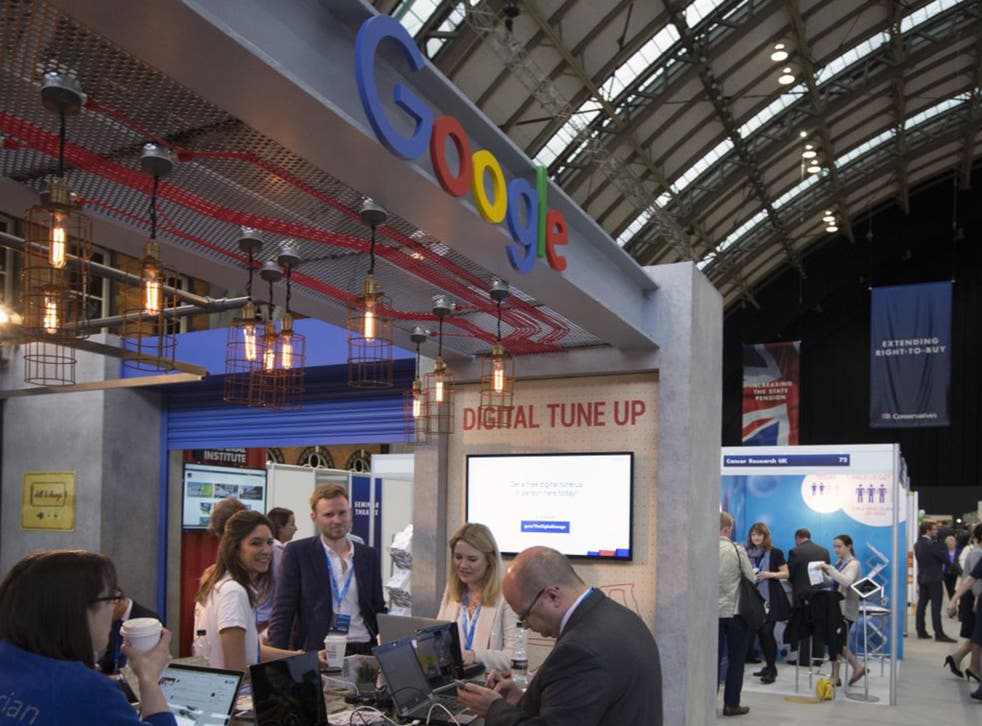Google, one of the companies under fire, has a stand at the Tory party conference