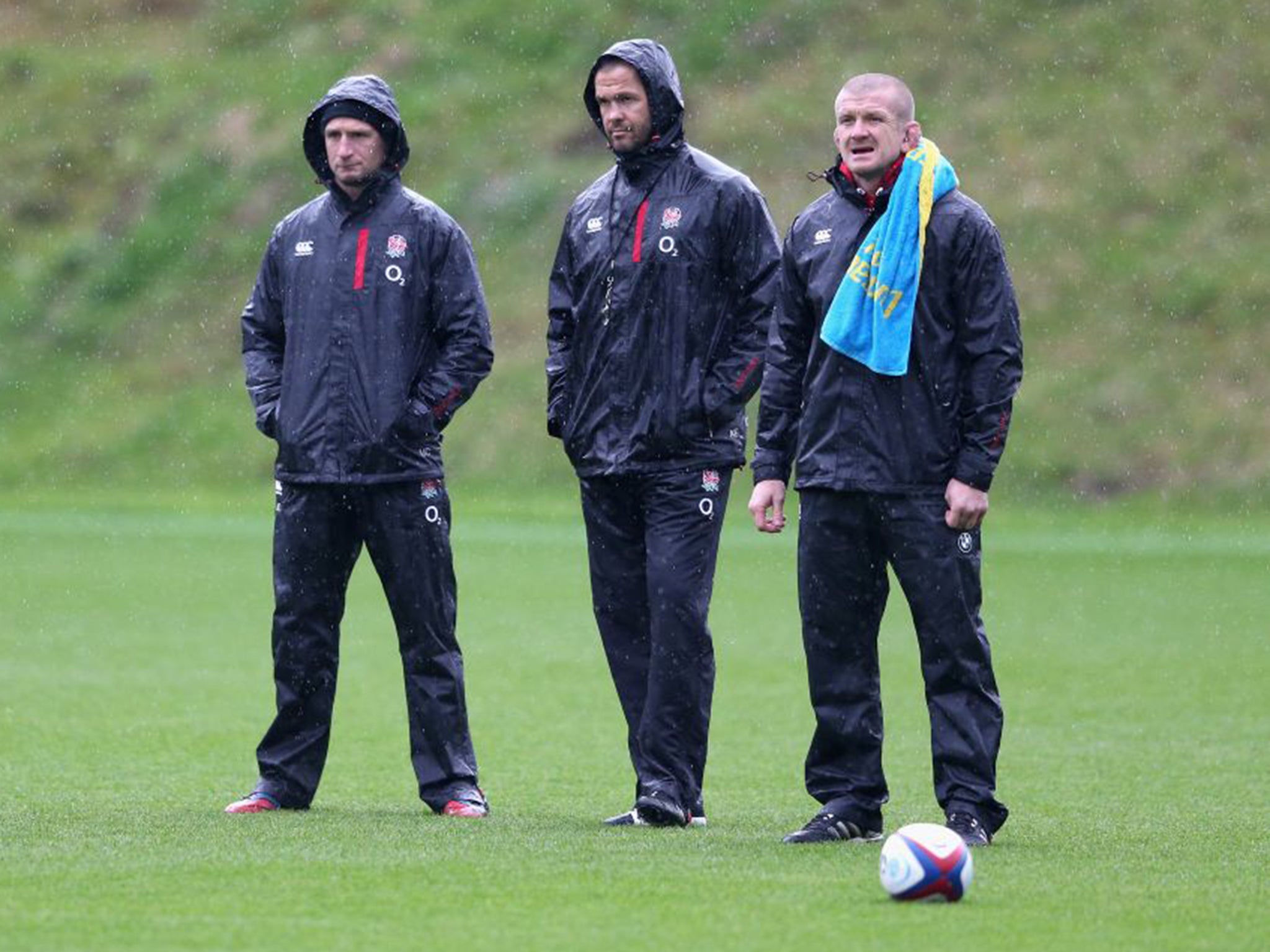 From left: Mike Catt, Andy Farrell and Graham Rowntree watch an England training session
