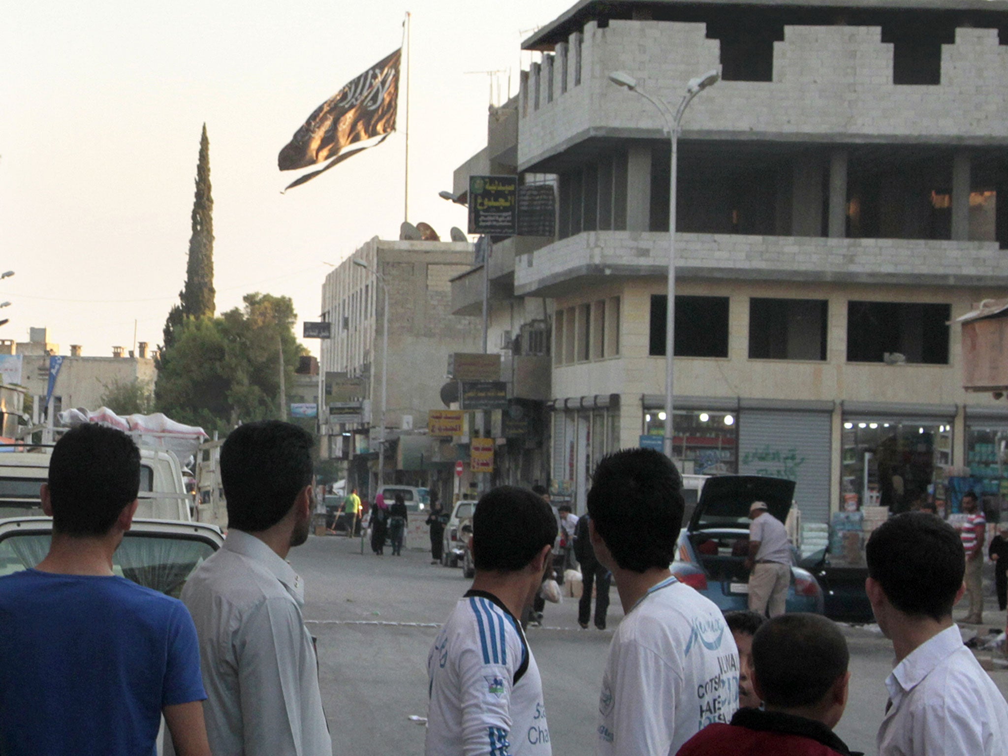 
The Isis flag flying in Raqqa 