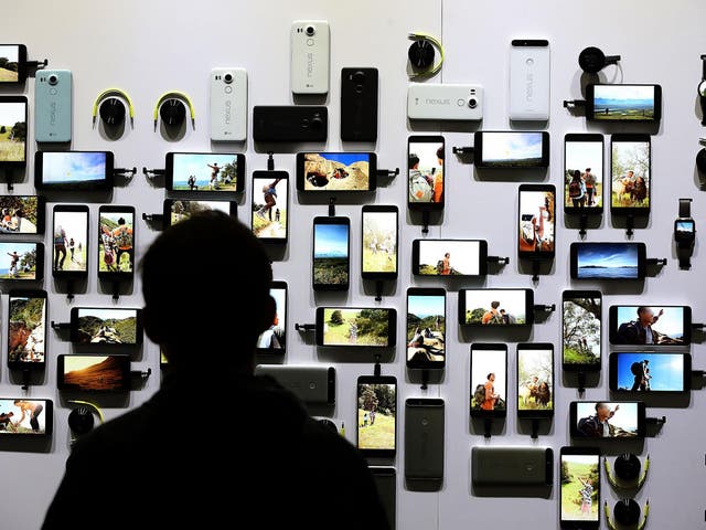 An attendee looks at a display of new Google devices during a Google media event on September 29, 2015 in San Francisco, California