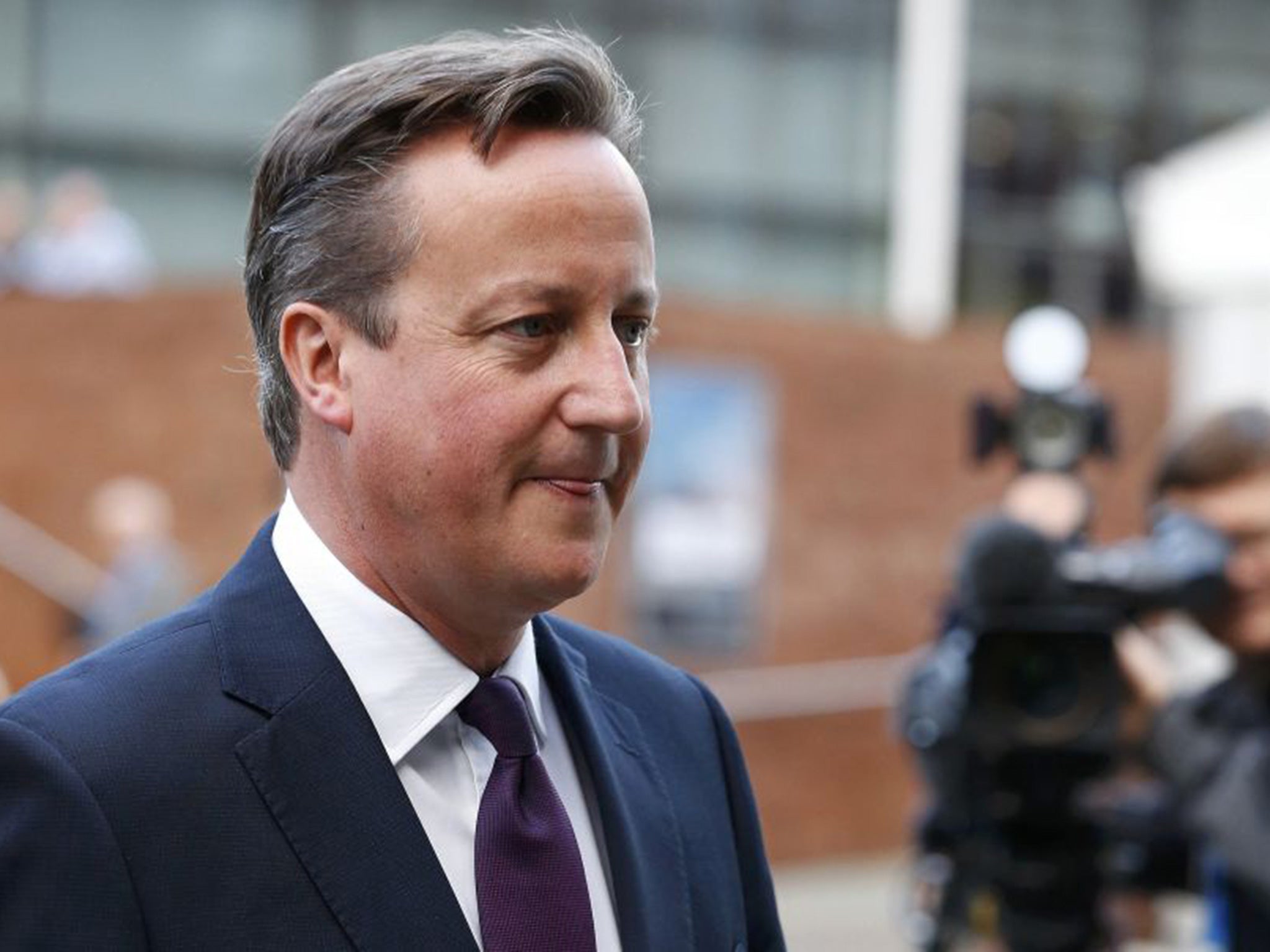 David Cameron leaves Manchester Central with MP for Eastbourne Caroline Ansell