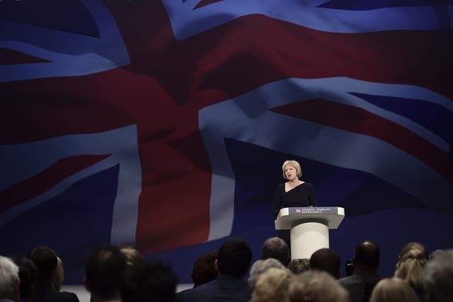 Home Secretary Theresa May gives a speech on the third day of the annual Conservative party conference in Manchester,