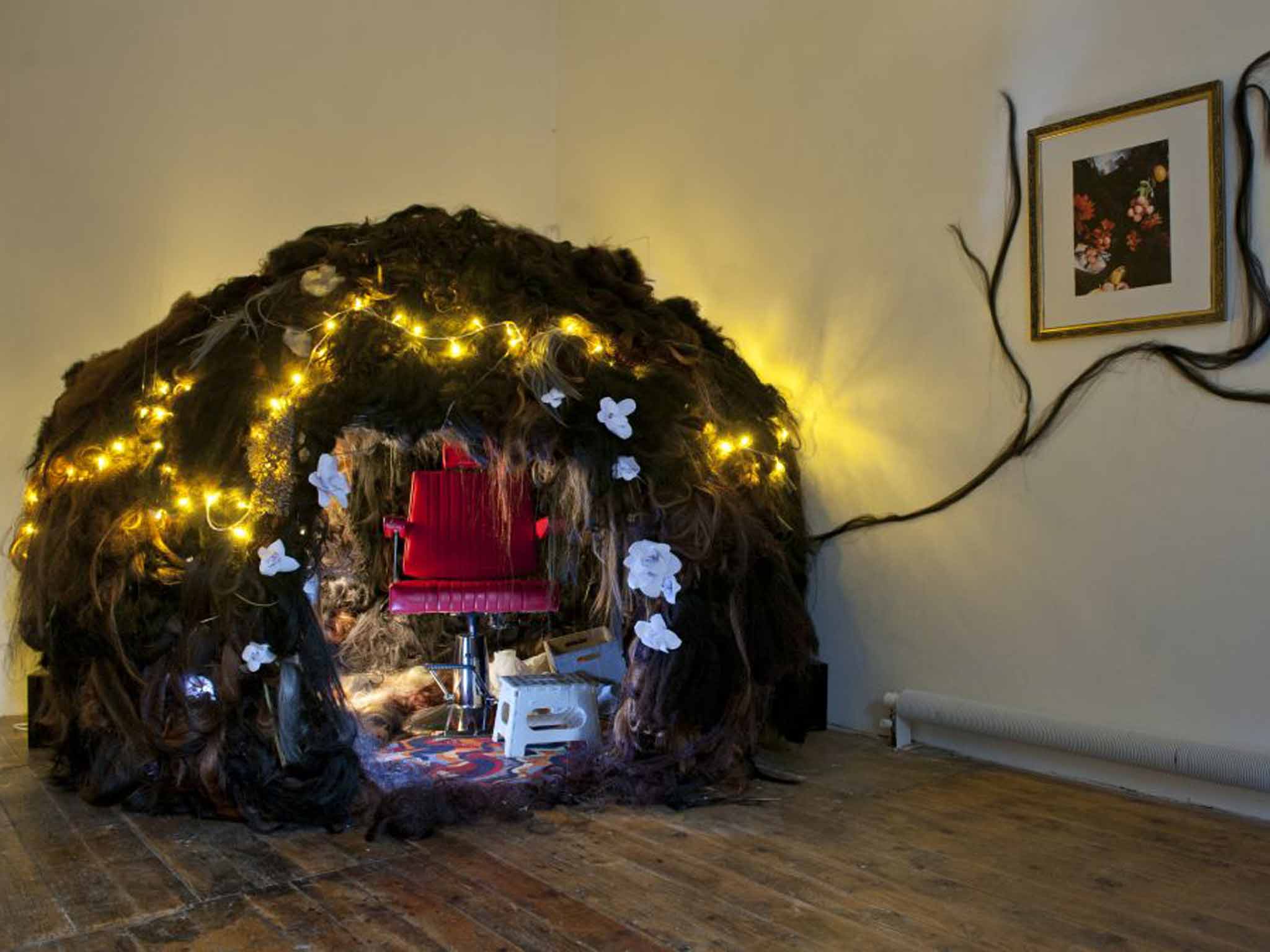 The seven-foot 'tumbleweave', made from hair extensions, that forms the centrepiece of 'Dark & Lovely'
