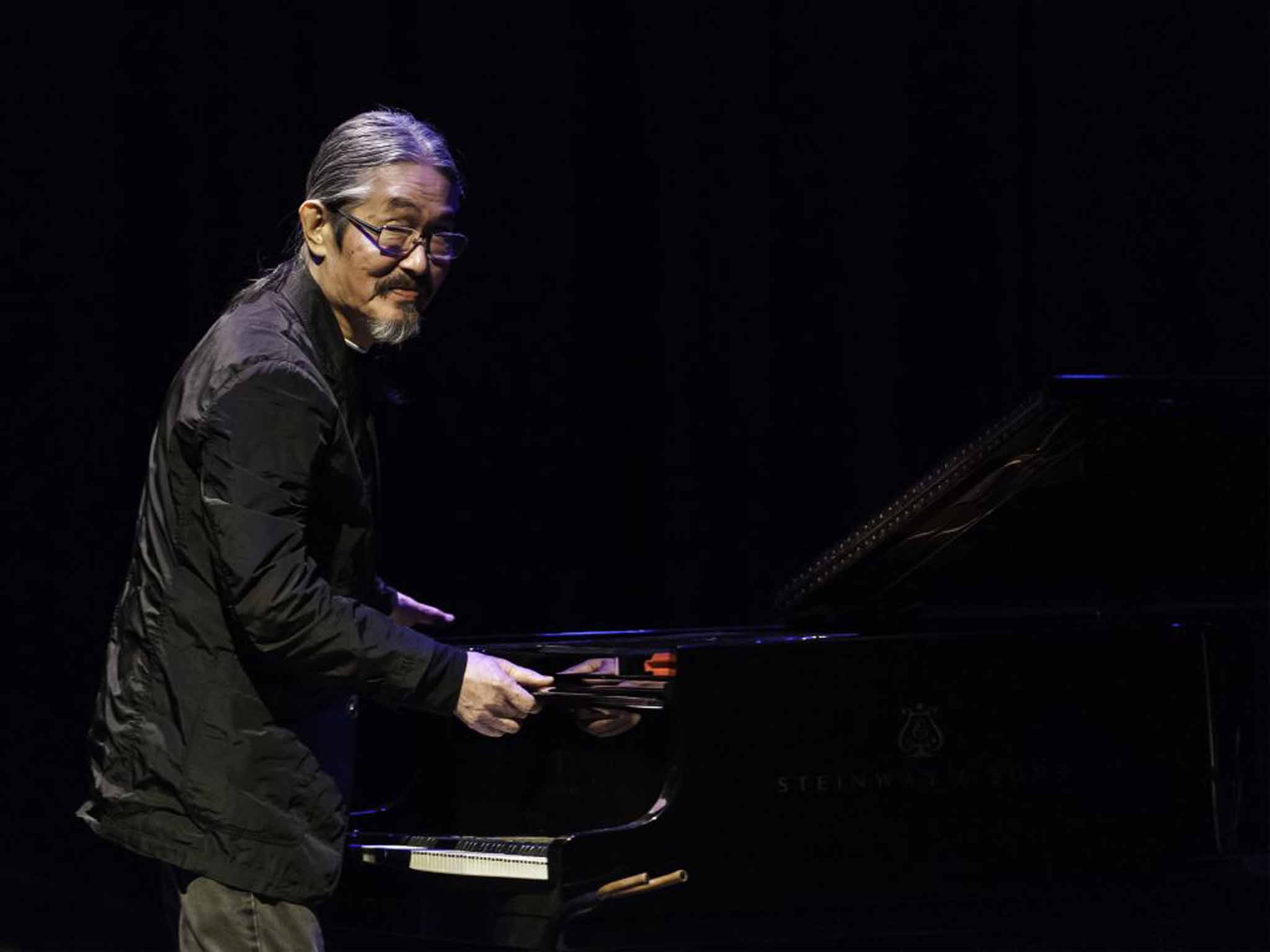 Kikuchi in 2013, performing at a tribute concert for his former collaborator, Paul Motian