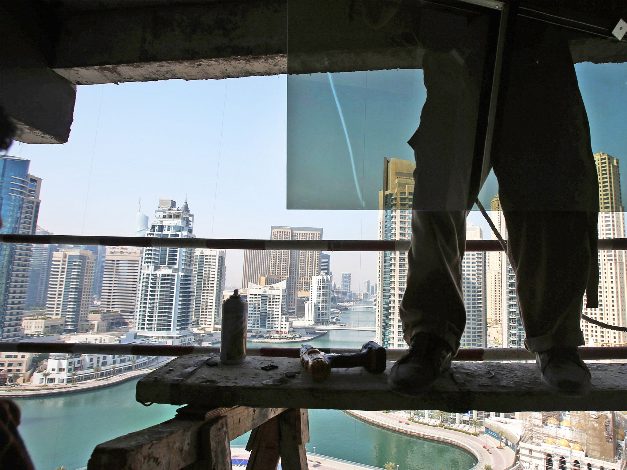 Faulty towers: Dubai is home to big business, luxury tourism and wealth but as in the rest of the UAE, its citizens are prevented from speaking out and risk jail if they do