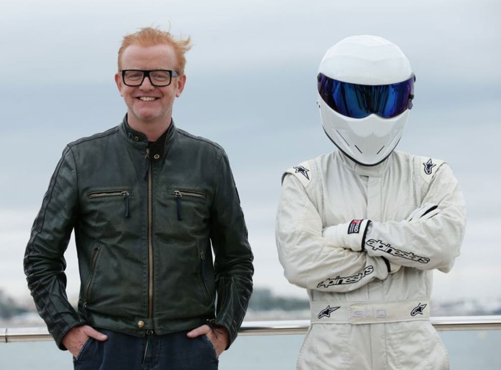 Chris Evans, the new presenter of BBC's Top Gear programme, and The Stig pose together