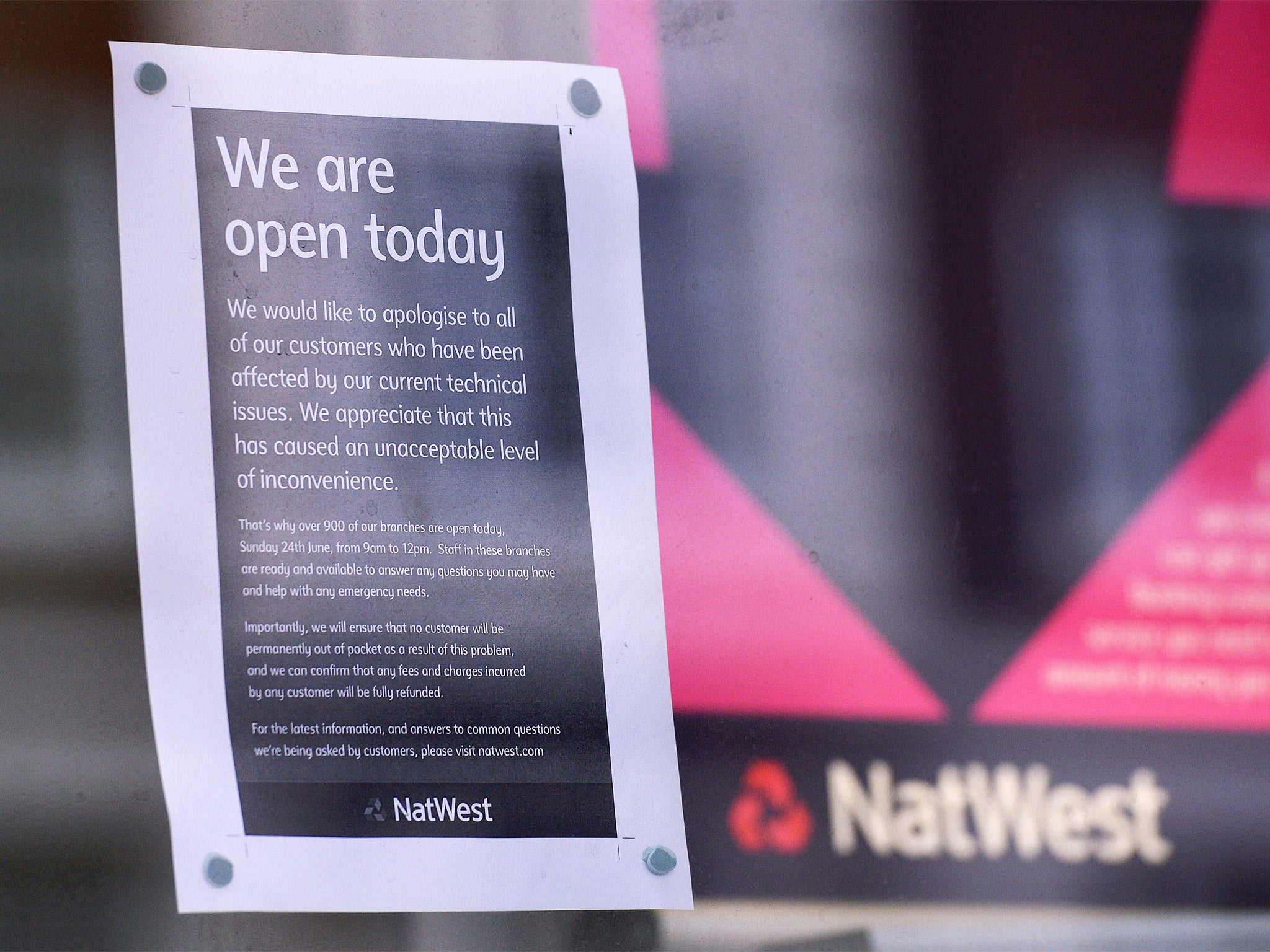 A sign in the window of a NatWest branch apologises to customers for technical issues – which have increasingly affected big banks’ PR