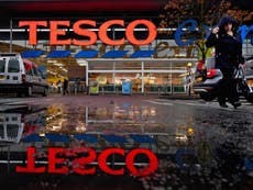 Tesco first-half profits slide despite signs of improvement