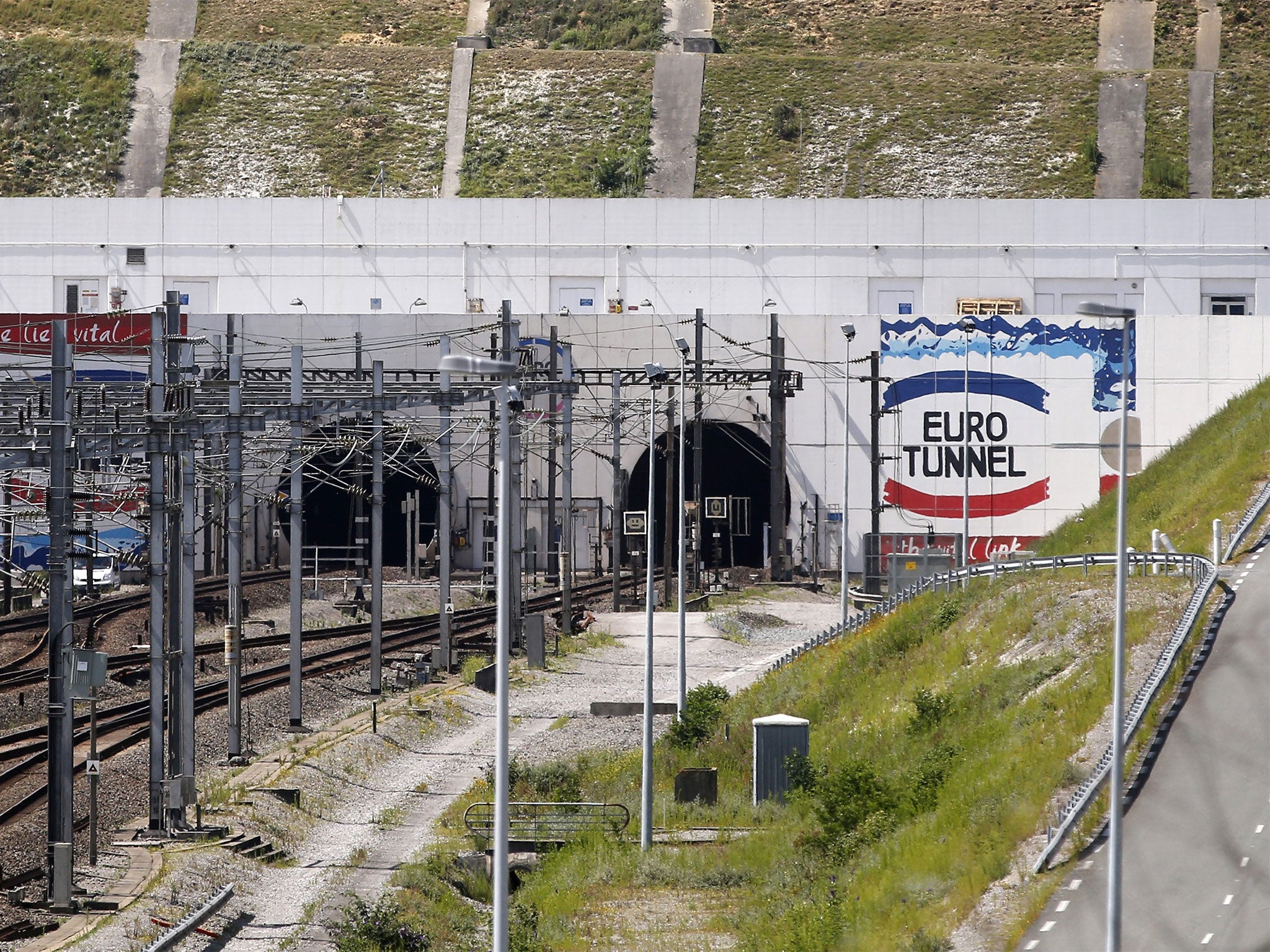 The men allegedly walked 31 miles through the tunnel from Calais to Folkestone, Kent