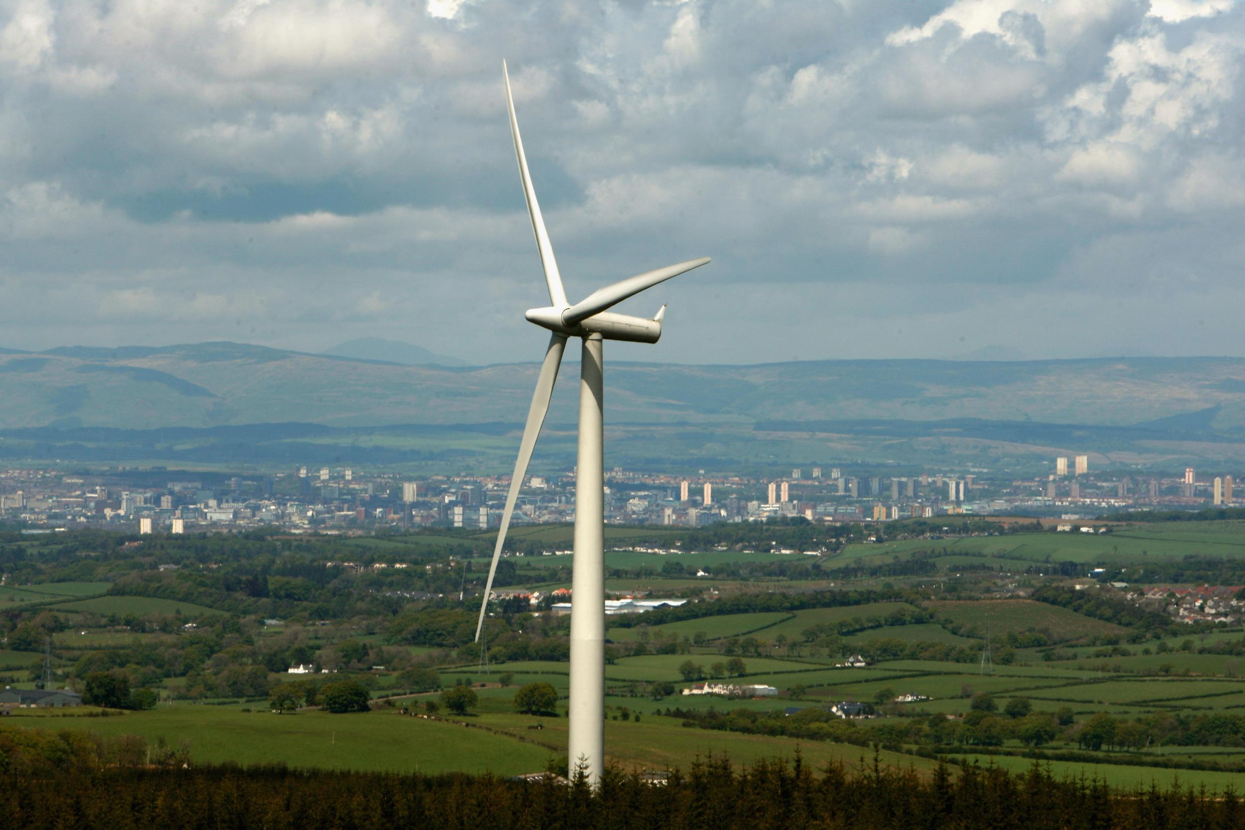 A wind turbine stands at Whitelee Wind Farm, the biggest in the UK