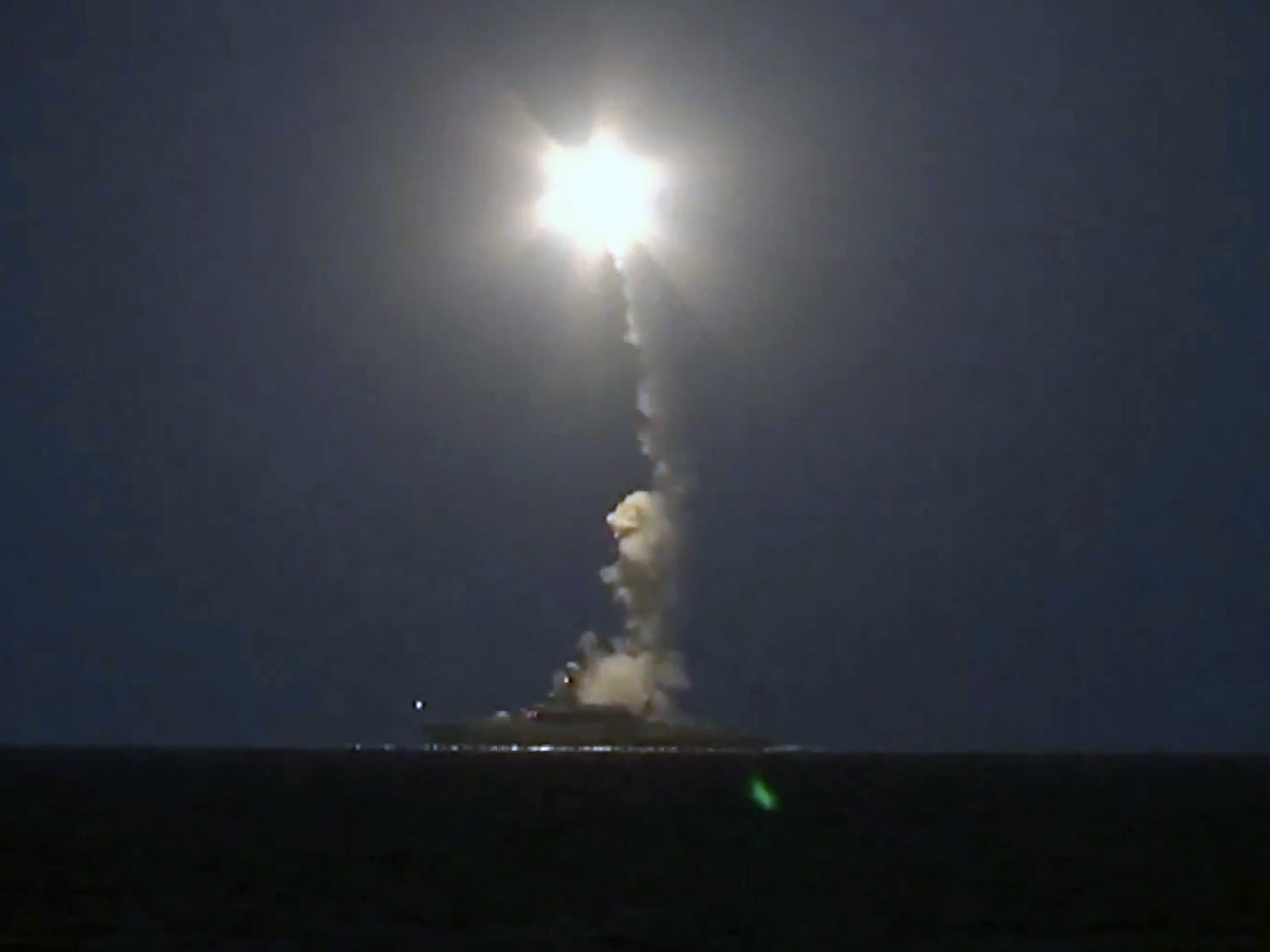 A Russian warship of the Caspian Flotilla launching missiles on Wednesday