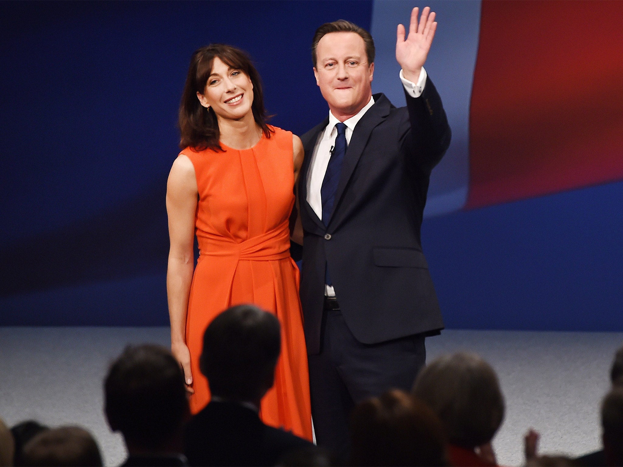 David Cameron and his wife Samantha milk the applause after his keynote speech