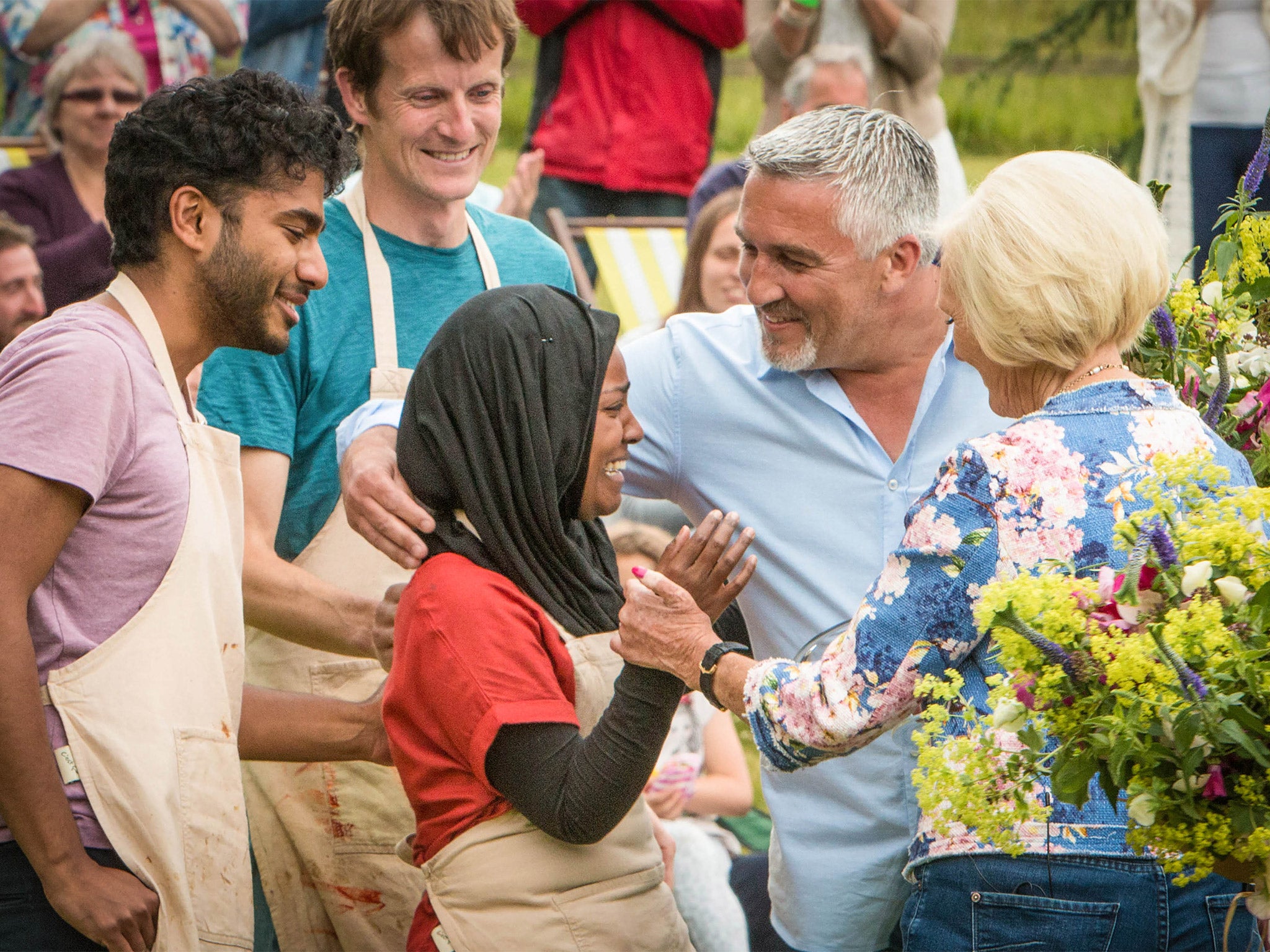 Nadiya has a moment with Paul Hollywood and Mary Berry; Ian and Tamal look on