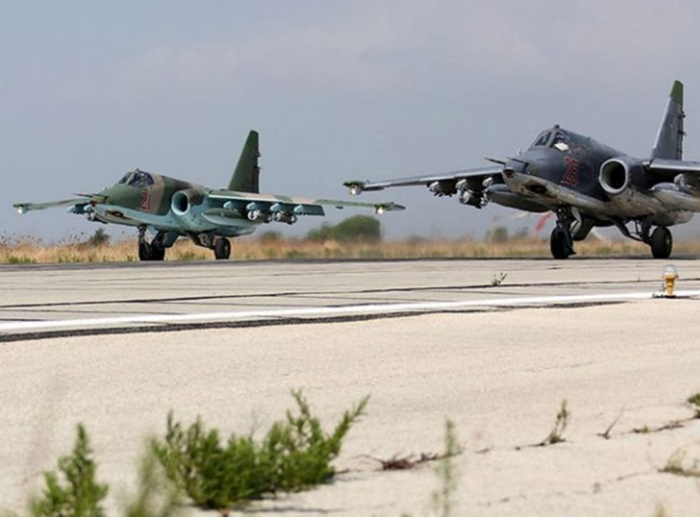 Russian SU-25  strike fighters taking off from the Syrian Hmeymim airbase, outside Latakia, Syria.
